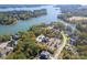 Lakefront community with homes surrounded by lush landscaping and neighborhood pool at 5059 Valita Rd, York, SC 29745