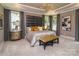 Serene main bedroom with tray ceilings, large windows, and plush carpets at 5059 Valita Rd, York, SC 29745
