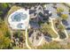Aerial view of the community clubhouse, pool, playground, and surrounding green space at 5075 Valita Rd, York, SC 29745