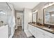 Elegant bathroom featuring a tiled shower and double vanity with modern fixtures at 5075 Valita Rd, York, SC 29745
