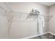 Spacious closet features metal shelving and neutral wall paint with plush carpet flooring at 5075 Valita Rd, York, SC 29745