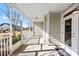 Inviting screened-in porch with a ceiling fan providing a comfortable outdoor space at 5075 Valita Rd, York, SC 29745