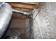 Basement showing exposed wires and brick foundation wall at 5127 Murrayhill Rd, Charlotte, NC 28210