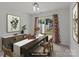 Elegant dining room with stylish decor, sliding door to back yard at 5312 Peach Place Ln, Charlotte, NC 28216