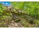 Outside view of the backyard and stairs leading up to the house at 5615 American Way, Denver, NC 28037