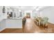 Modern kitchen leads to dining area and front entry at 5615 American Way, Denver, NC 28037