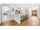 Kitchen offers granite countertops and a breakfast bar with a view of the front entry at 5615 American Way, Denver, NC 28037