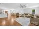 The living room is large and opens to the dining and kitchen areas at 5615 American Way, Denver, NC 28037