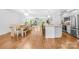 Open-concept living space featuring a combined kitchen, dining, and Gathering room layout at 5615 American Way, Denver, NC 28037