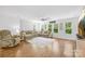 Spacious living room with lots of windows allowing for natural light at 5615 American Way, Denver, NC 28037