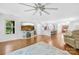 Open-concept living room connects kitchen, dining, and living areas at 5615 American Way, Denver, NC 28037