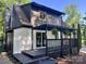 Back exterior featuring a deck and landscaping, perfect for outdoor entertaining at 6501 Piney Path Rd, Charlotte, NC 28212