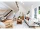 Bright living room boasts vaulted ceiling, natural light, and modern decor at 6501 Piney Path Rd, Charlotte, NC 28212