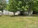Exterior view of a single-story home and mature trees at 6504 Denver Heights Cir, Denver, NC 28037