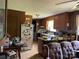 Cozy kitchen featuring wood cabinets and vintage decor at 675 E Ritchie Rd, Salisbury, NC 28146