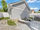 Backyard patio area with lounge chairs and bench, ideal for relaxation and enjoying outdoor living at 6909 Dunton St, Huntersville, NC 28078