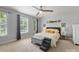 Cozy bedroom featuring a comfortable bed, ambient lighting, and serene decor, creating a relaxing retreat at 6909 Dunton St, Huntersville, NC 28078