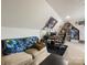 Spacious bedroom features a comfortable couch and desk area, perfect for work or relaxation at 6909 Dunton St, Huntersville, NC 28078