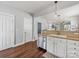 Open kitchen design with stainless steel appliances, seamlessly connecting the cooking space to adjacent living areas at 6909 Dunton St, Huntersville, NC 28078