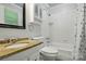 Bathroom featuring granite counters, a tub-shower combo, and white cabinets at 707 Hester Dr, Dallas, NC 28034