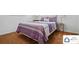 Bedroom with a bed that has a purple bedspread and matching pillows at 707 Hester Dr, Dallas, NC 28034