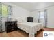 Cozy bedroom featuring plush carpet, two dressers and patterned curtains at 707 Hester Dr, Dallas, NC 28034