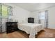 Cozy bedroom with natural light, dresser and night stands at 707 Hester Dr, Dallas, NC 28034