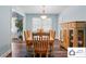 Formal dining room featuring wood floors and a classic chandelier at 707 Hester Dr, Dallas, NC 28034