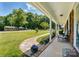 Inviting front porch with seating, potted plants, and a 'Welcome' mat, creating a warm entry at 707 Hester Dr, Dallas, NC 28034