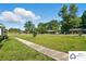 Well-kept front yard featuring a lush lawn, a sidewalk, and neatly trimmed hedges around the property at 707 Hester Dr, Dallas, NC 28034