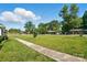 Residential street view showcasing a well-kept lawn and sidewalks in a quiet neighborhood at 707 Hester Dr, Dallas, NC 28034