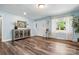 Bright living room with wood floors, updated decor, and lots of natural light at 707 Hester Dr, Dallas, NC 28034