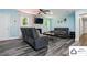 Inviting living room with a stacked stone fireplace and gray wood flooring at 707 Hester Dr, Dallas, NC 28034