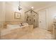 Elegant bathroom features a soaking tub and separate glass shower with modern fixtures at 7138 Wessynton Dr, Charlotte, NC 28226