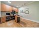 Office with built-in wooden desk and cabinetry providing ample storage space at 7138 Wessynton Dr, Charlotte, NC 28226