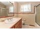 Bathroom with wood cabinets, a classic mirror, and vanity at 805 Waverly Pl # 16, Statesville, NC 28677
