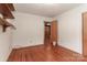 Bedroom with hardwood floors, neutral walls and view to hallway at 805 Waverly Pl # 16, Statesville, NC 28677