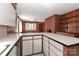Open kitchen featuring plenty of counter space, cabinetry and eat-in nook at 805 Waverly Pl # 16, Statesville, NC 28677