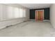 Spacious carpeted living room with natural light creates a welcoming atmosphere for gatherings at 805 Waverly Pl # 16, Statesville, NC 28677