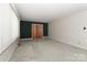 Large living room with neutral carpet and plenty of natural light for flexible arrangement at 805 Waverly Pl # 16, Statesville, NC 28677