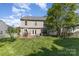 The property boasts a well-maintained yard, brick patio, and mature trees enhancing outdoor enjoyment at 815 Clearbrook Rd, Matthews, NC 28105