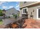 Outdoor patio with dining area and flower arrangement providing a cozy and inviting space at 815 Clearbrook Rd, Matthews, NC 28105