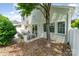 Backyard featuring a patio area with seating, mature trees, and privacy fence at 8734 Meadowmont View Dr, Charlotte, NC 28269