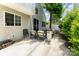 Back patio features outdoor seating and mature landscaping at 8734 Meadowmont View Dr, Charlotte, NC 28269