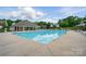 Enjoy the community pool with extensive deck, covered lounge area, perfect for recreation at 8833 Cavonnier Ln, Charlotte, NC 28216