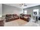 Spacious living room featuring comfortable seating, neutral walls and carpeted flooring at 1026 Slew O Gold Ln, Indian Trail, NC 28079