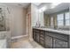 Granite vanity in this bathroom featuring a glass-enclosed shower at 1026 Slew O Gold Ln, Indian Trail, NC 28079