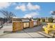 Community outdoor kitchen with built-in grills, stone facade, and convenient picnic area at 1026 Slew O Gold Ln, Indian Trail, NC 28079