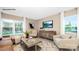 Bright living room features ample natural light, recessed lighting, modern decor, and luxury vinyl flooring at 1027 Hostler Ln, York, SC 29745