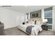Spacious main bedroom boasts plush carpeting, two large windows, and neutral paint at 1027 Hostler Ln, York, SC 29745